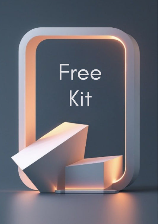 A 3D-rendered promotional graphic with the words 'Free Kit' centered inside a glowing rounded rectangular frame. The design uses soft warm peach lighting and neutral gray surfaces, with geometric display blocks in the foreground.
